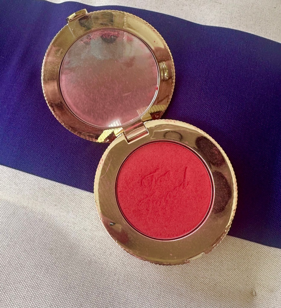 Photo of the bright pink Watermelon Rain blush from Too Faced Cosmetics. 
